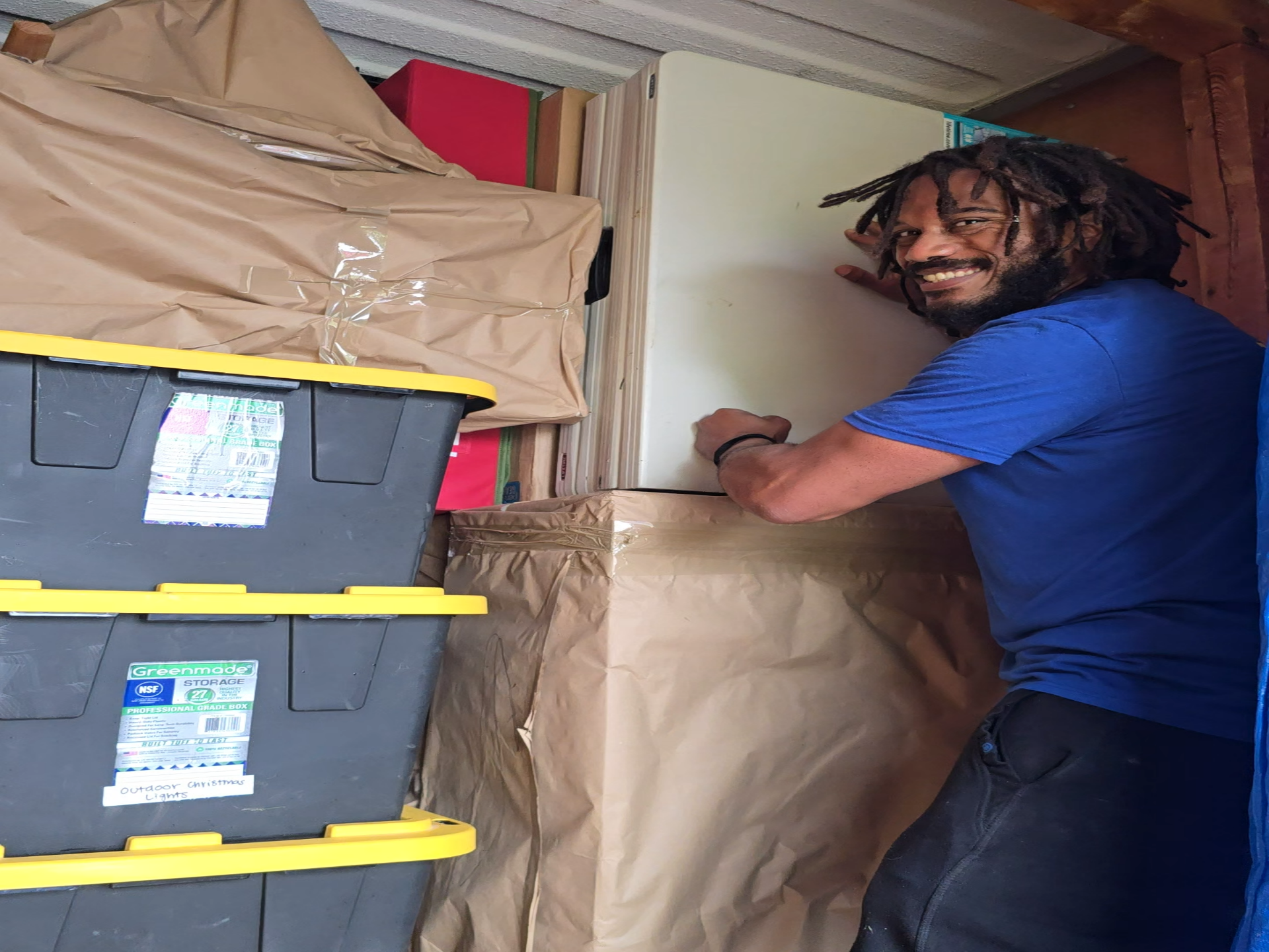 Mover Dudes helping with downsizing moving and storage container loading support